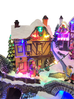 Winter Christmas Village with Train. Christmas Miniature.