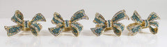 Fennco Styles Stunning Crystal Bowknot Gold-Plated Napkin Rings Wedding Holiday Table Decoration - Set of 4