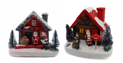 Christmas Cottage with Santa. Village