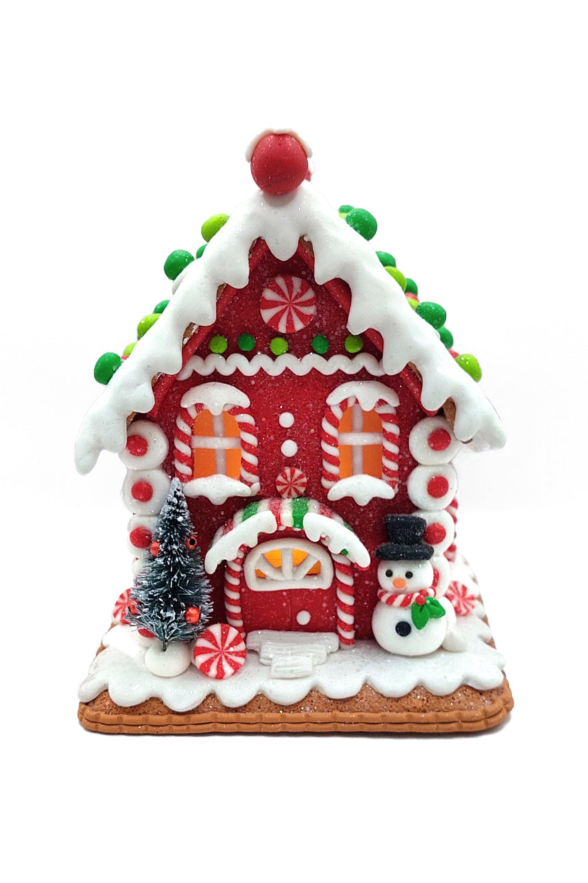 Christmas Gingerbread House with Snowman. Festive Decoration