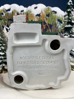 Department 56 Illuminated House. Elfie's Sleds and Skates. North Pole Series. Hand Painted Porcelain Building with Lights. Christmas Decor.
