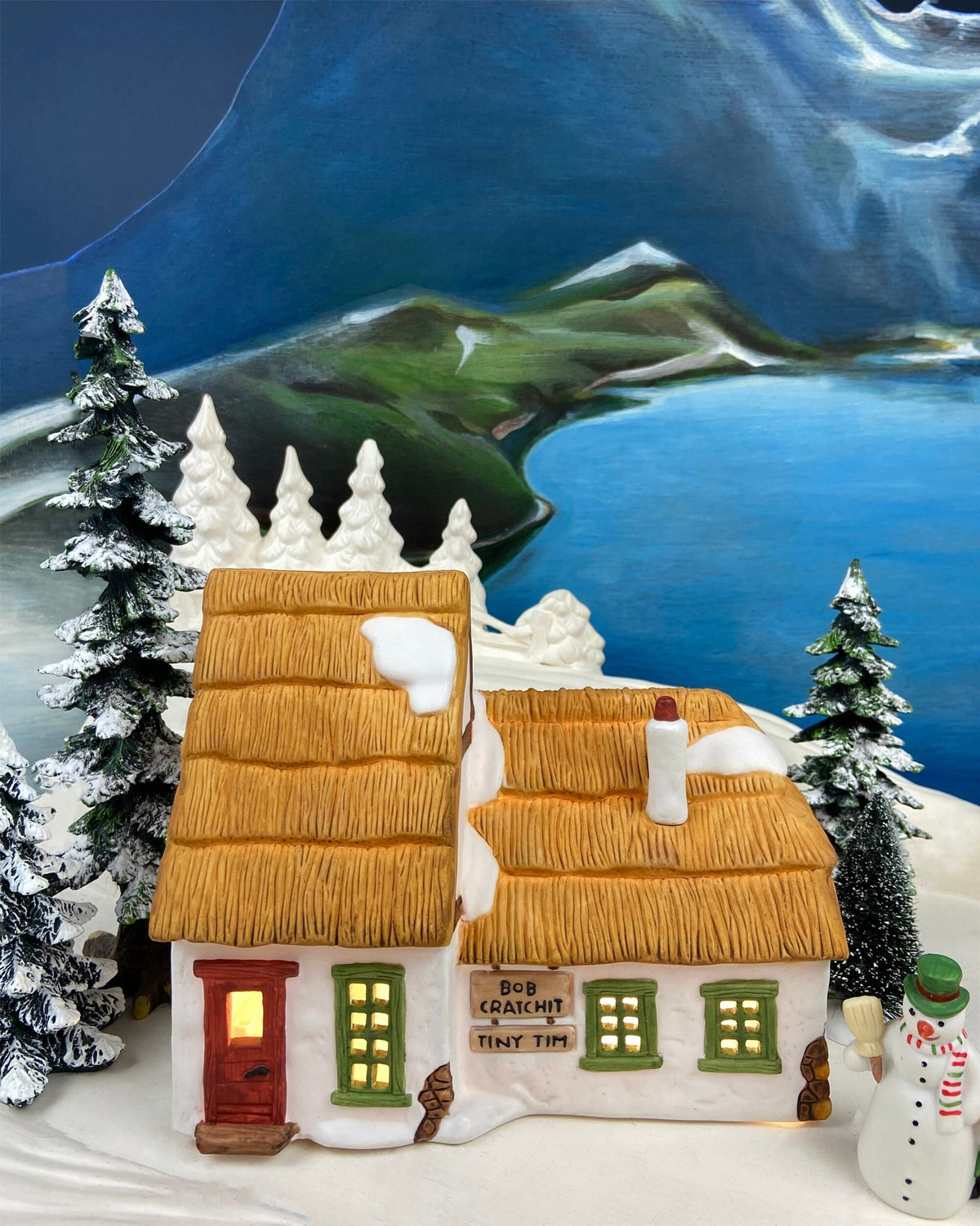 Christmas Village Accessories. Illuminated Cottage of Bob Cratchit and Tiny Tim. Dicken's Village Series.