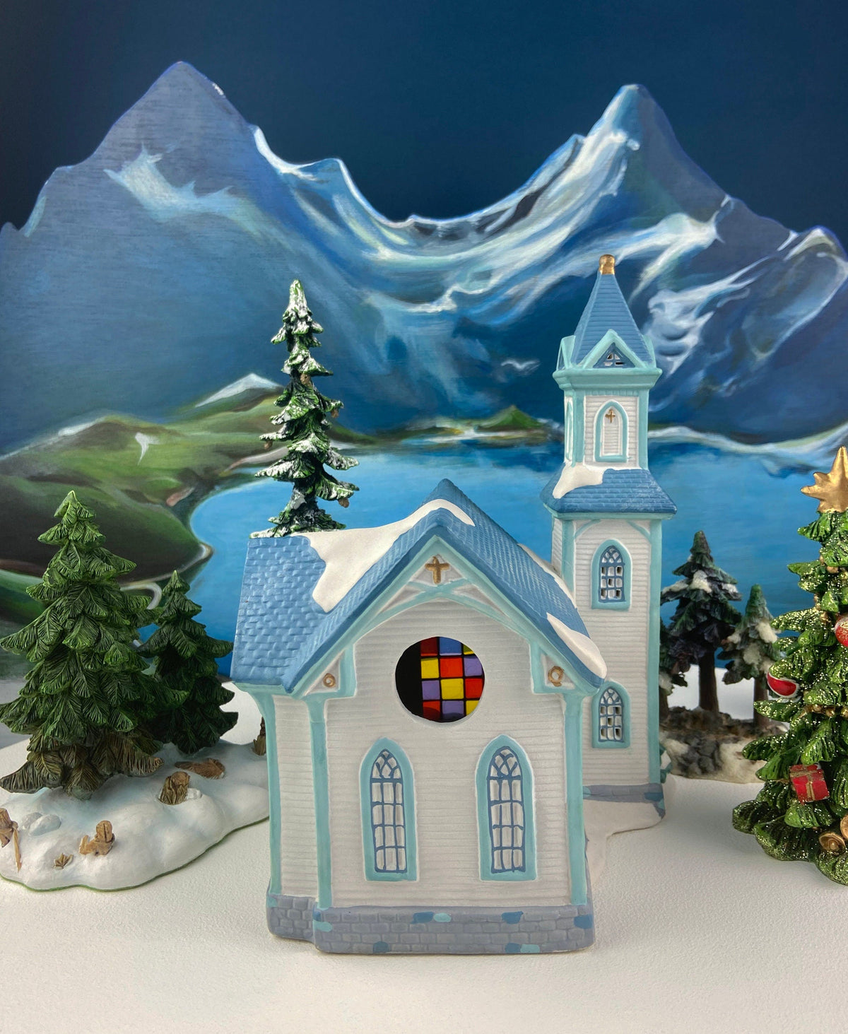 Christmas Village Cedar Valley Chapel Towne Series. Illuminated Blue Church with Stained Glass Window. Santa's Workbench. Night Light.