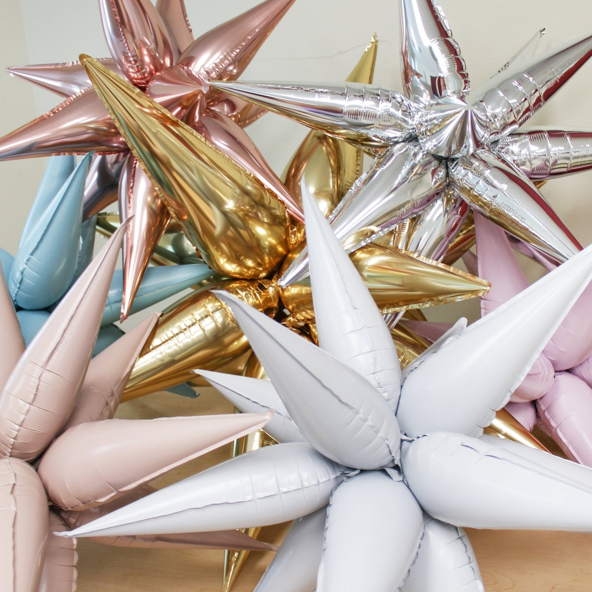 Rose Gold Starburst Cluster Balloon | Chrome Metallic Foil Star